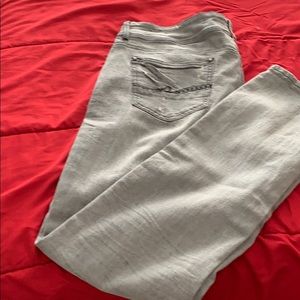 Distress mid rise gray jeans